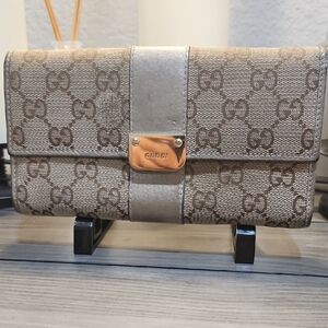 Gucci Brown Wallet with Iconic Monogram Design